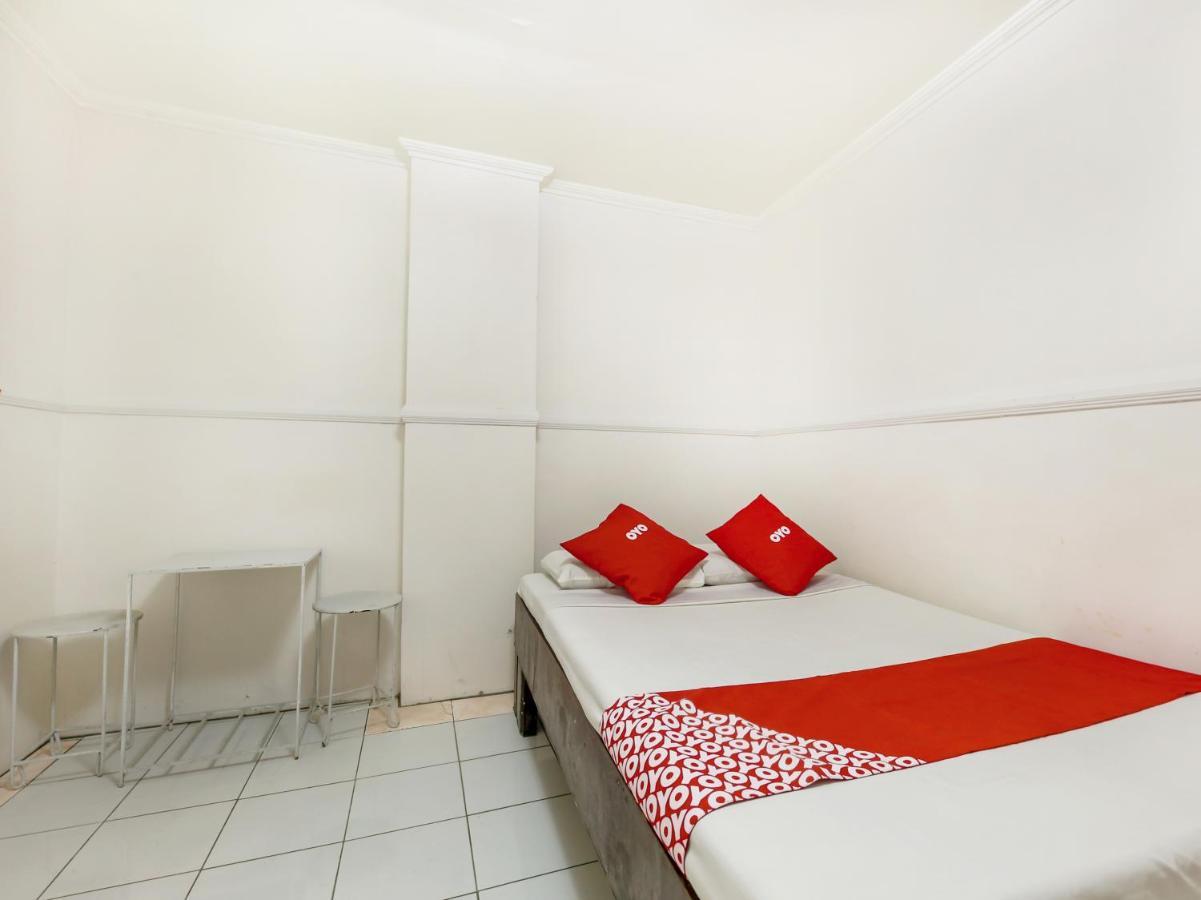 Hotel Oyo 842 Smiles Apartelle 2*